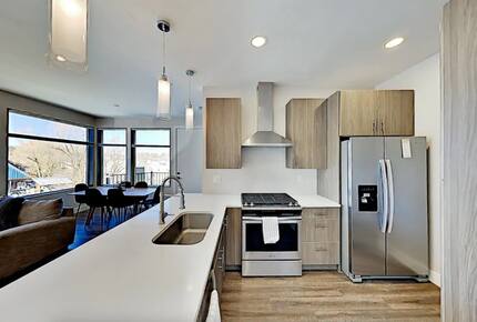 Modern kitchen with island and stainless steel appliances