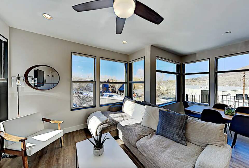 Main floor living room with beige sectional