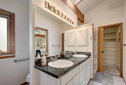 Downstairs master bath with dual vanity granite countertop