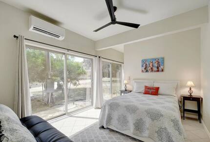 Downstair Retreat master with queen bed & sliding glass door