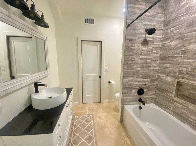 Newly renovated full bathroom downstairs in Retreat