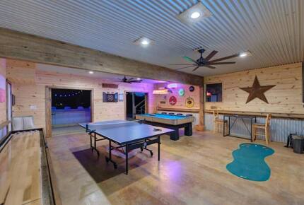 Retreat game room with doors opening to patio