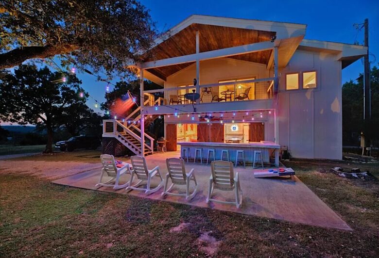 Exterior view of Retreat outdoor bar area at night