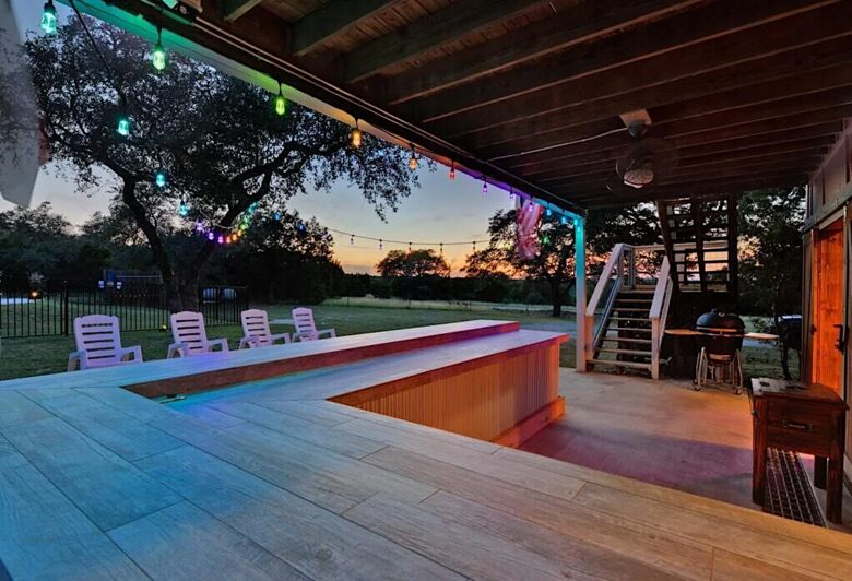 Outdoor bar at night at the Retreat & charcoal grill/smoker