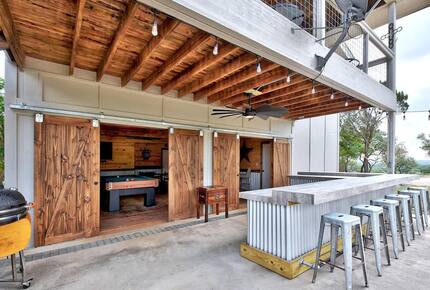 Exterior view of Retreat bar with 6 stools during the day