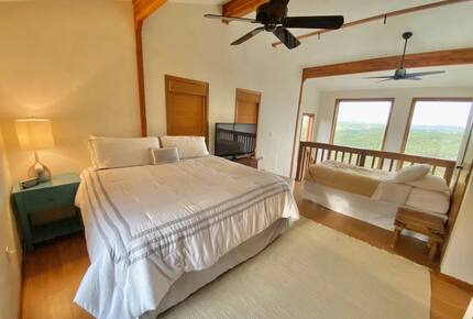 Loft bedroom with king bed and twin bed