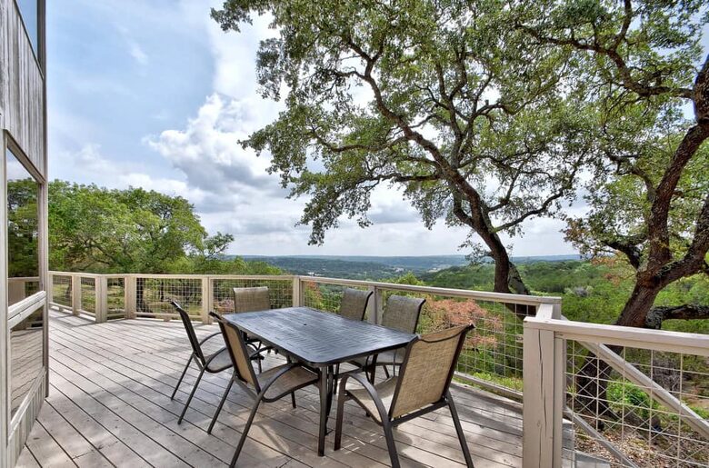 Deck with patio table overlooking Hill Country