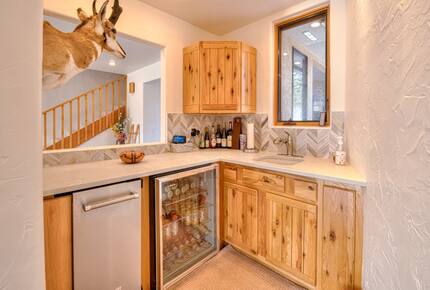 Home exchange in La Veta CO, wet bar with fridge and dishwasher