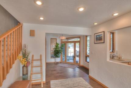 Home exchange in La Veta CO, front entryway near staircase and wet bar