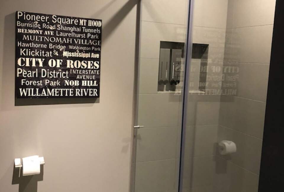 Home exchange in Portland, OR, guest bathroom shower with glass doors