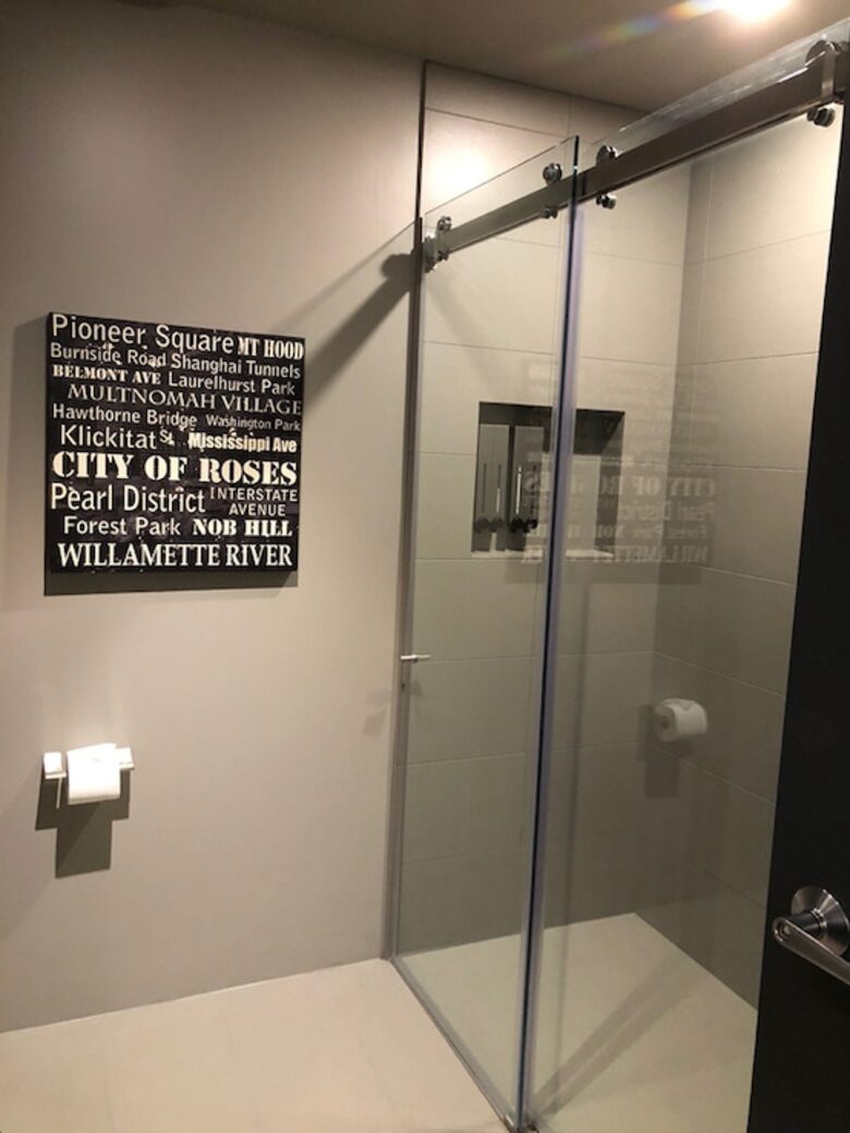 Home exchange in Portland, OR, guest bathroom shower with glass doors