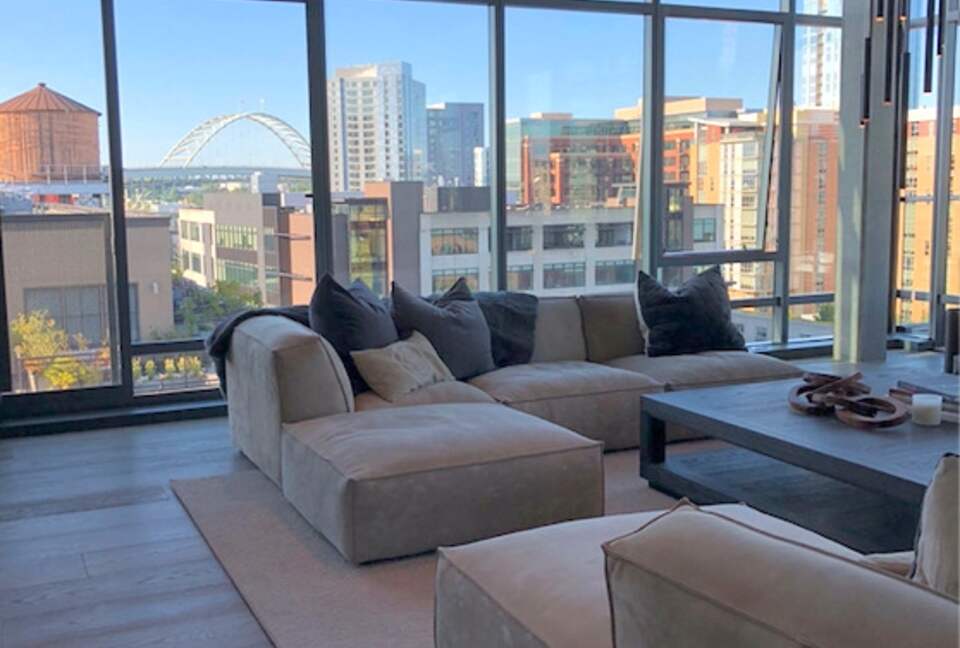 Home exchange in Portland, OR, penthouse living room with big windows
