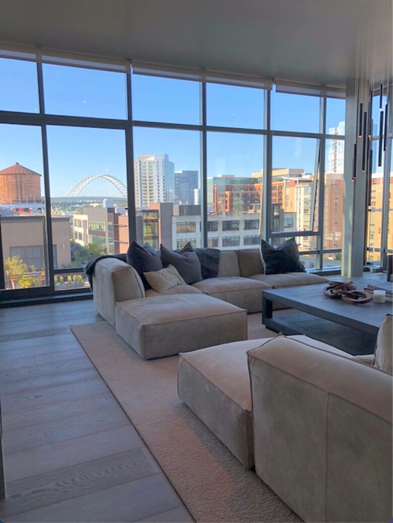 Home exchange in Portland, OR, penthouse living room with big windows