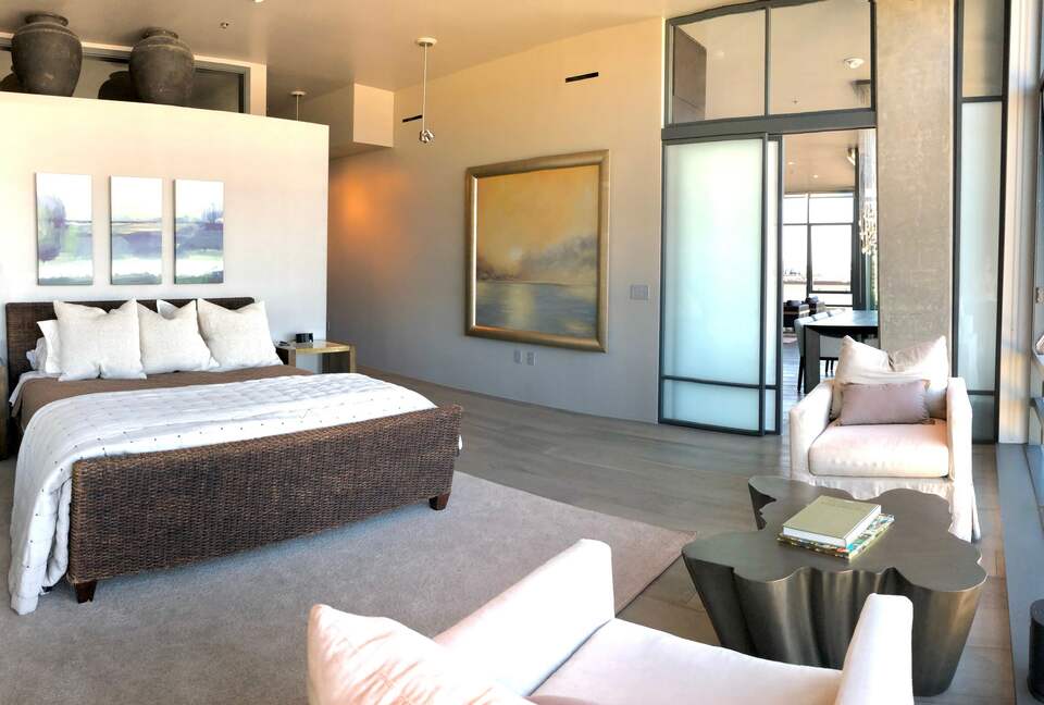 Home exchange in Portland, OR, master bedroom with king bed & seating