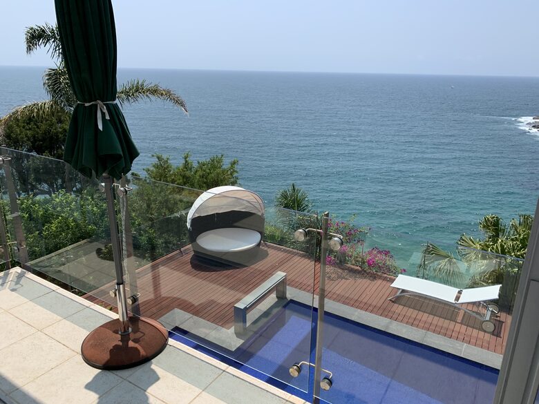 Your private plunge pool and lounging deck just steps below.