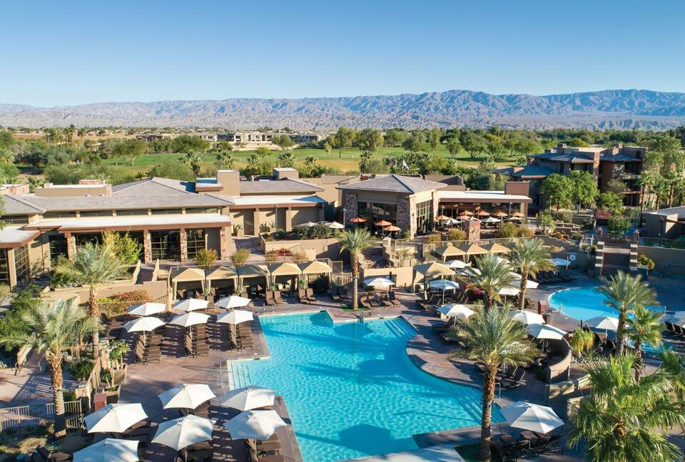 Home exchange at Westin Desert Willow Villas, aerial view of pools