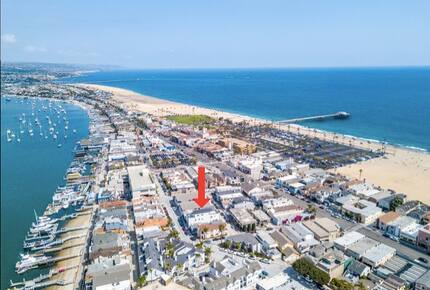 Home exchange in Newport Beach CA, aerial view of the home and beach
