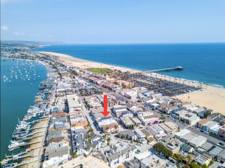 Home exchange in Newport Beach CA, aerial view of the home and beach