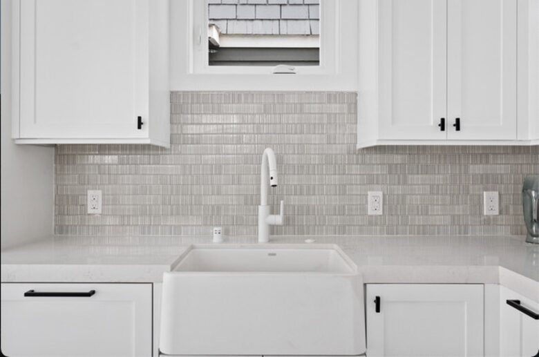 Home exchange in Newport Beach CA, all white kitchen & farmhouse sink
