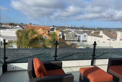 Home exchange in Newport Beach CA, rooftop deck with furniture
