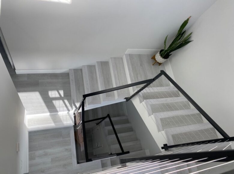 Home exchange in Newport Beach CA, staircase with black railings