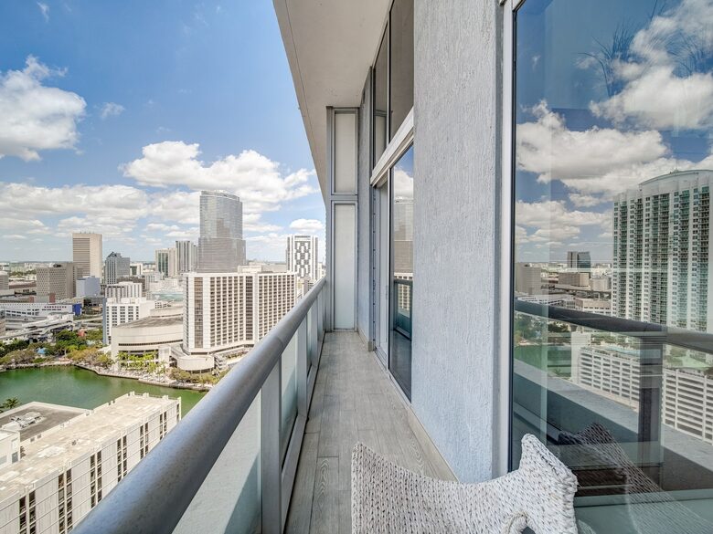 Home exchange in Miami FL, balcony overlooking the city and water