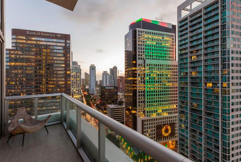 Home exchange in Miami FL, balcony overlooking the city at sunset