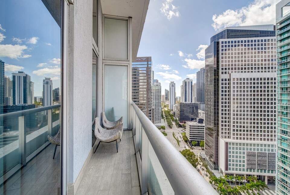 Home exchange in Miami FL, balcony with seating overlooking the city