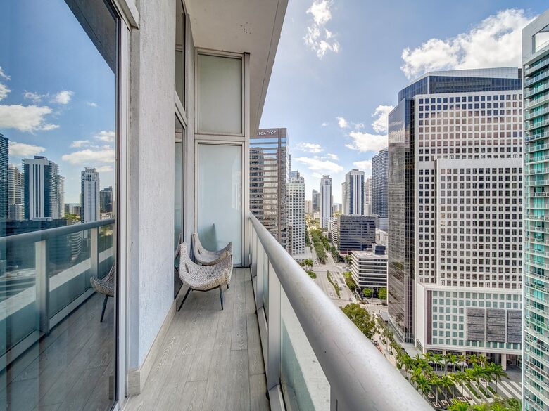 Home exchange in Miami FL, balcony with seating overlooking the city