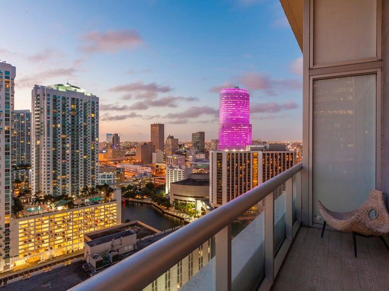 Home exchange in Miami FL, balcony overlooking the city at sunset