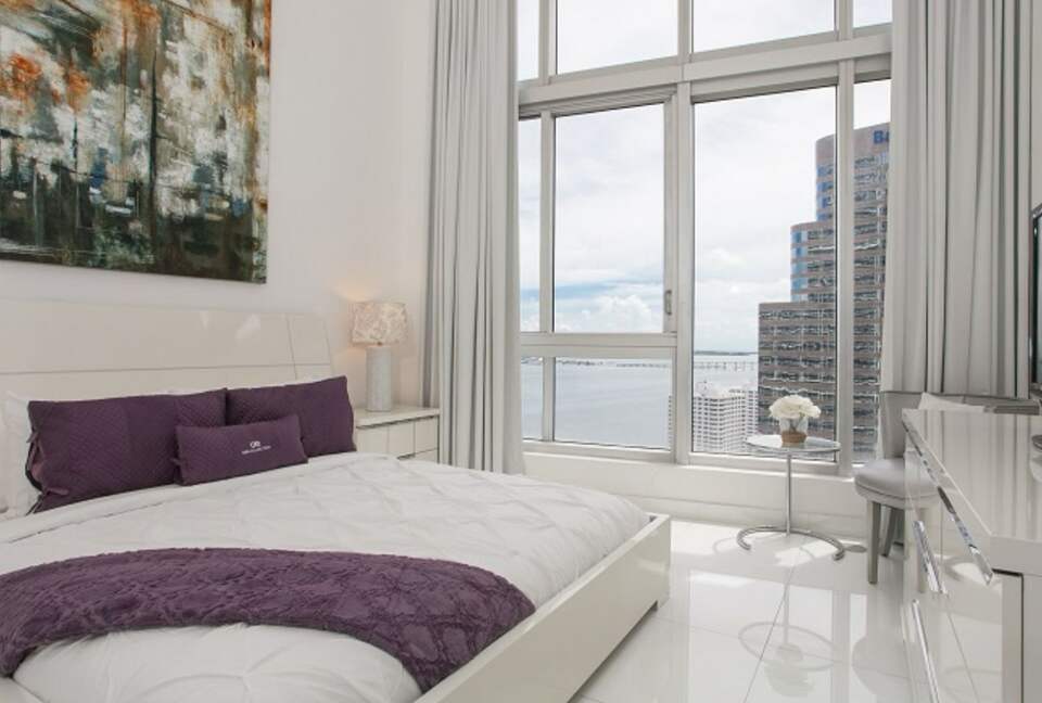 Home exchange in Miami FL, master bedroom with king bed and city views