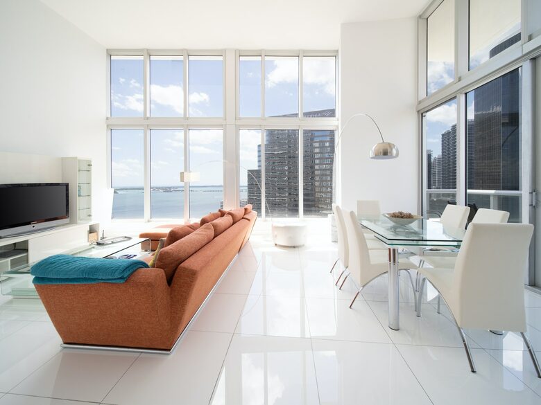 Home exchange in Miami FL, living room with TV and dining room