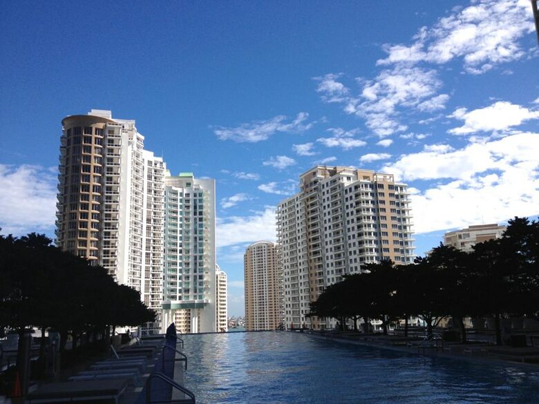 Home exchange in Miami FL, view of terrace pool and city buildings