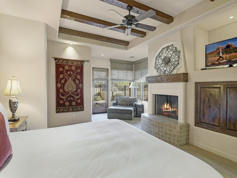 Home exchange in Scottsdale AZ, master bedroom with fireplace