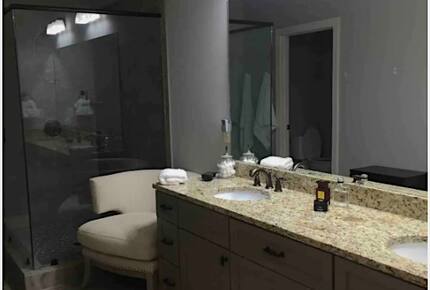 Home exchange in Auburn AL, master bathroom with dual vanity & shower