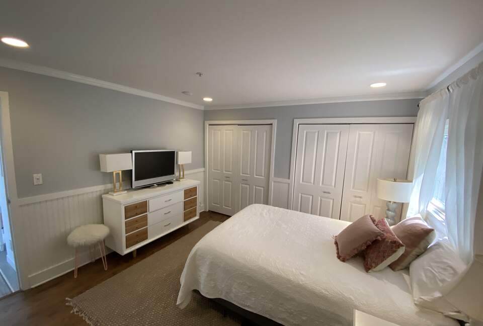 1st Floor Bedroom with Queen bed, TV & adjacent bathroom
