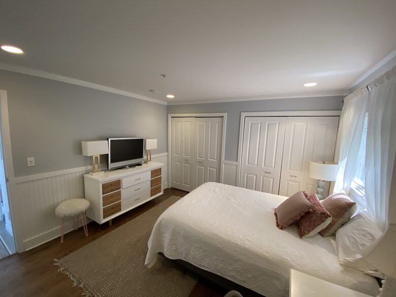 1st Floor Bedroom with Queen bed, TV & adjacent bathroom