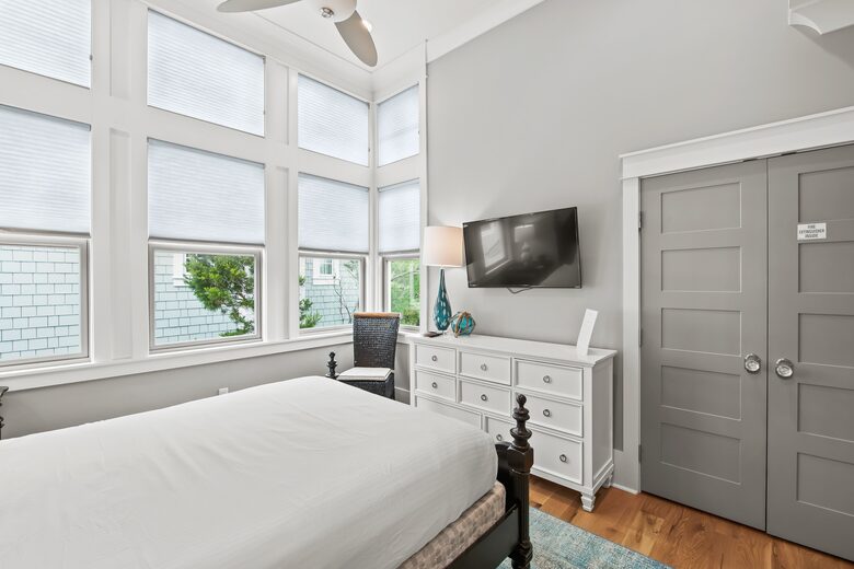 Home exchange in WaterSound FL, queen bedroom with flatscreen TV