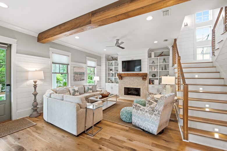 Home exchange in WaterSound FL, fireplace & sectional in living room