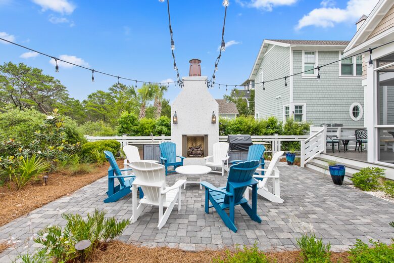 Home exchange in WaterSound FL, outdoor patio with fireplace