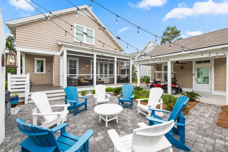 Home exchange in WaterSound FL, outdoor patio with 8 Adirondack chairs