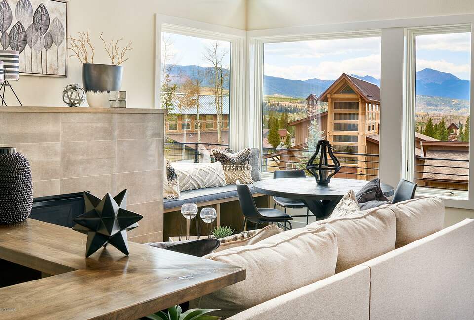 Home exchange in Fraser CO, living room with sunny oversized windows