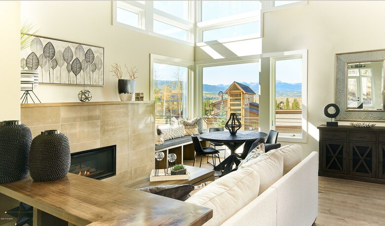Home exchange in Fraser CO, living room with sunny oversized windows