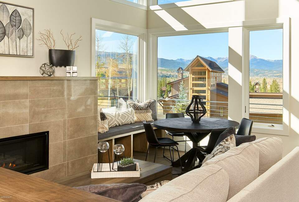 Home exchange in Fraser CO, living room with fireplace & seating