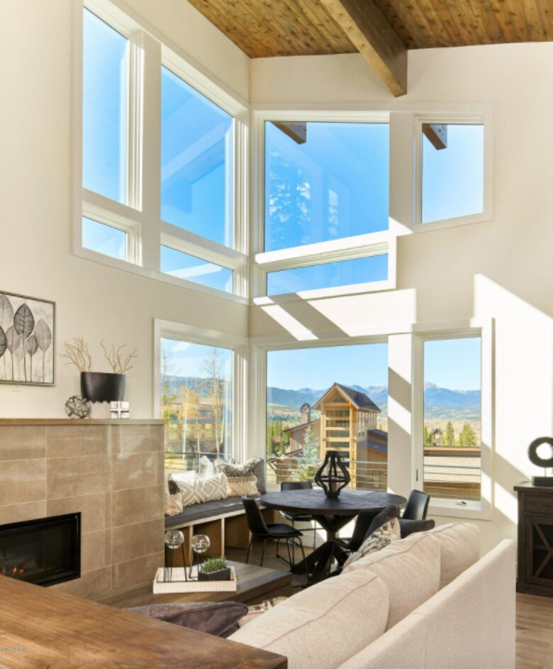 Home exchange in Fraser CO, living room with tall ceilings and windows