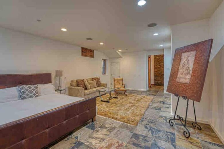 Home exchange in Calistoga CA, basement bedroom with king bed & couch