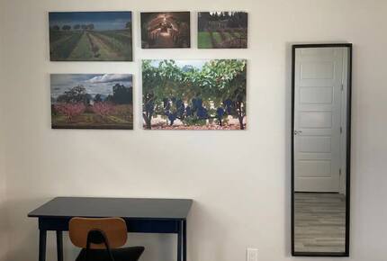 Home exchange in Cape Coral FL, bedroom with wall artwork and mirror