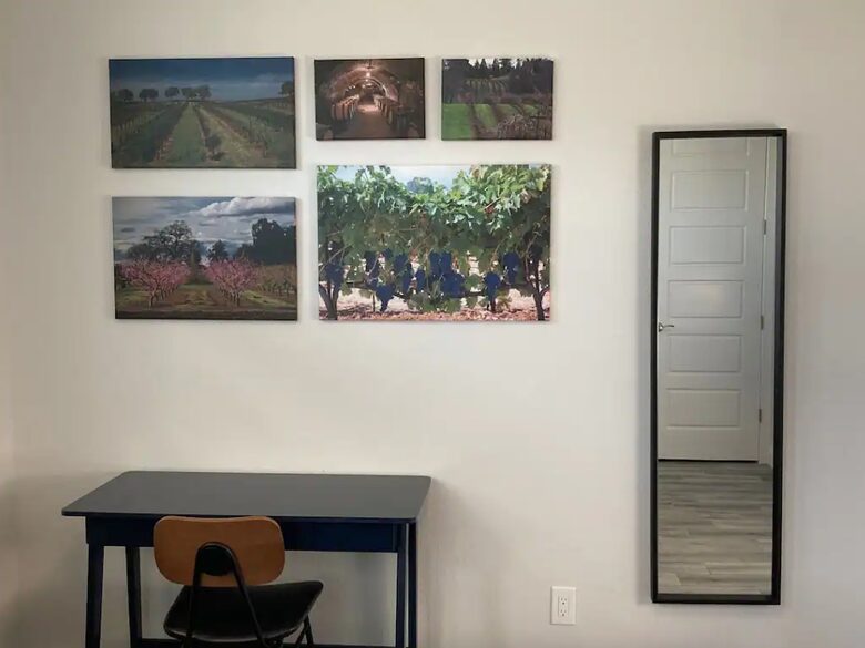 Home exchange in Cape Coral FL, bedroom with wall artwork and mirror