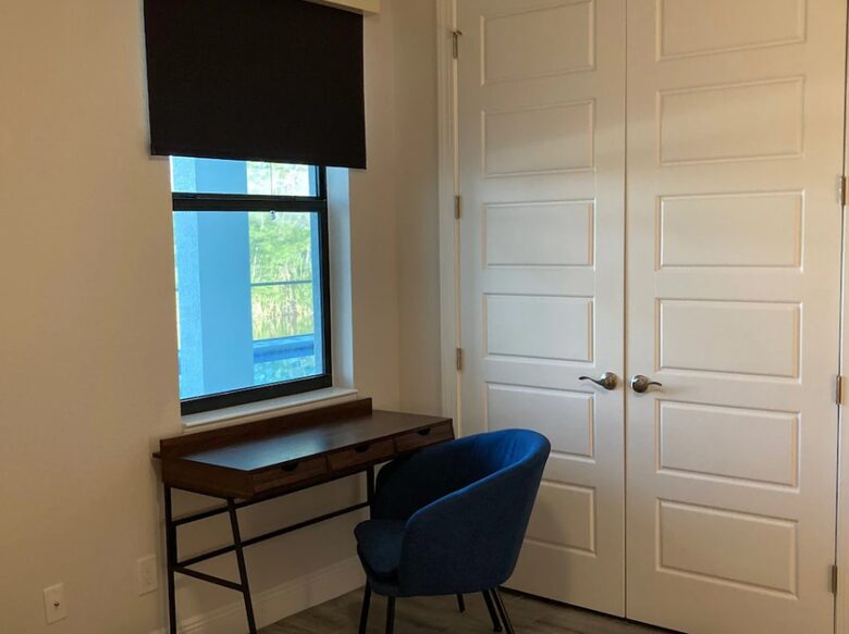 Home exchange in Cape Coral FL, bedroom with computer desk & closet