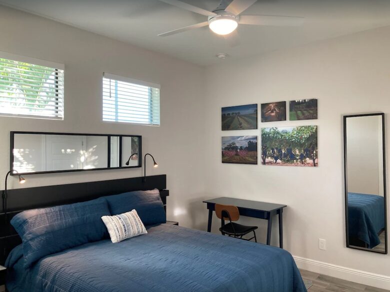 Home exchange in Cape Coral FL, bedroom with computer desk & mirror